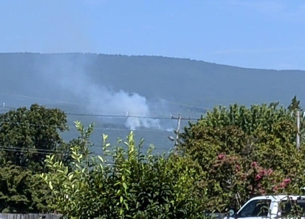 Crews work to extinguish Roanoke County brush fire
