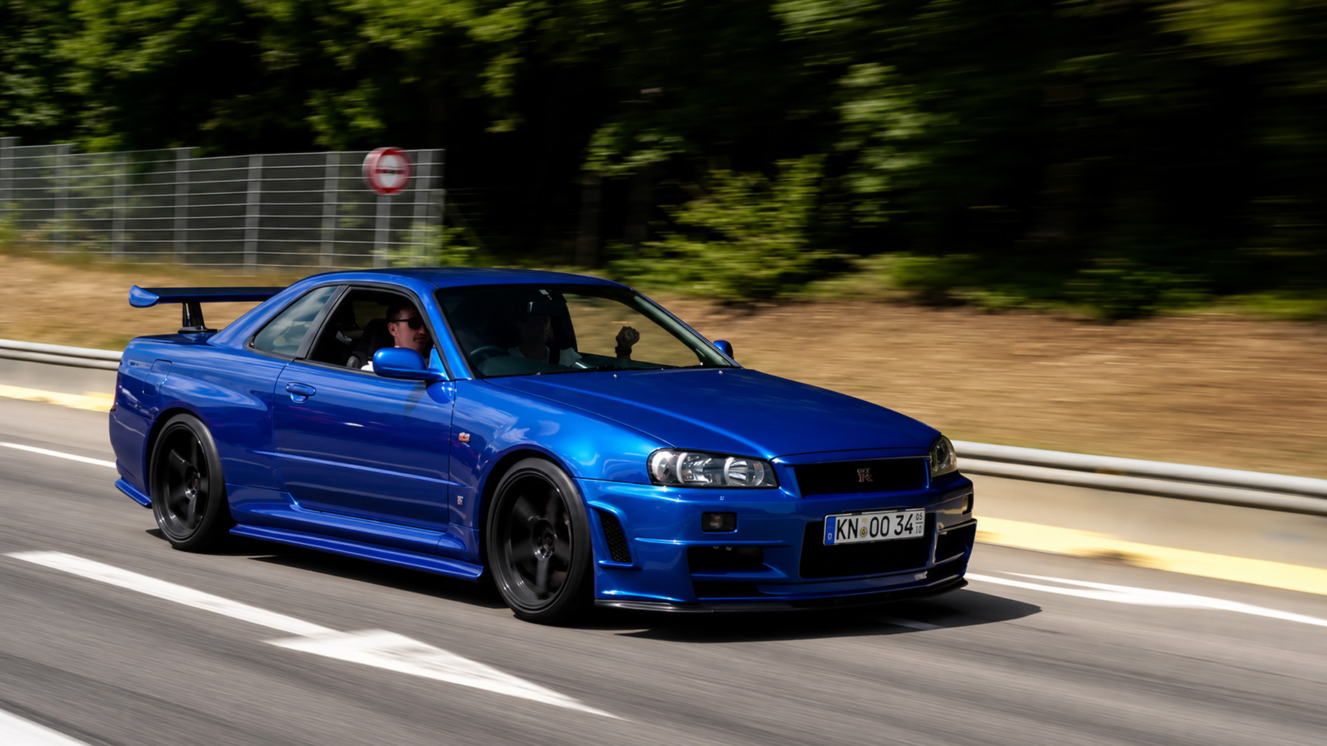 The iconic Nissan GT-R R34 pulls hard on open road