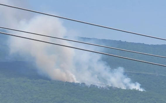 Crews work to extinguish Roanoke County brush fire