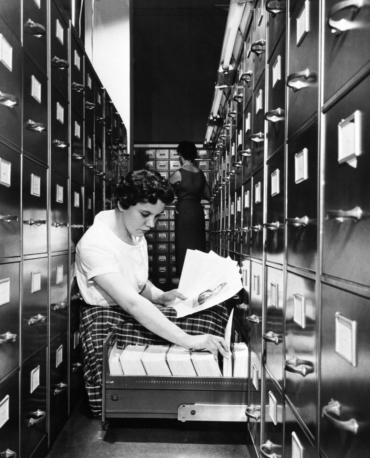 Photos of everyday office life before computers took over