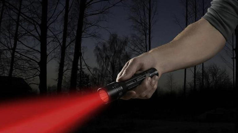What is a red light flashlight used for?