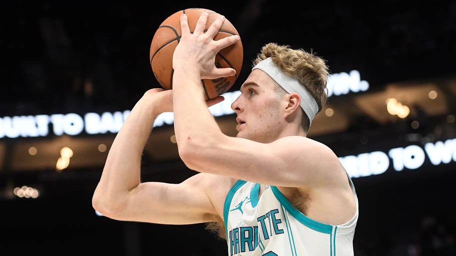Charlotte Hornets forward Liam McNeeley (33) looks to shoot for 3 points during the first half against the Denver Nuggets at