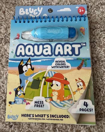 Bluey Aqua Art kit for ages 3+, includes water reveal pen and 4-page pad. Mess-free, color reveals with water