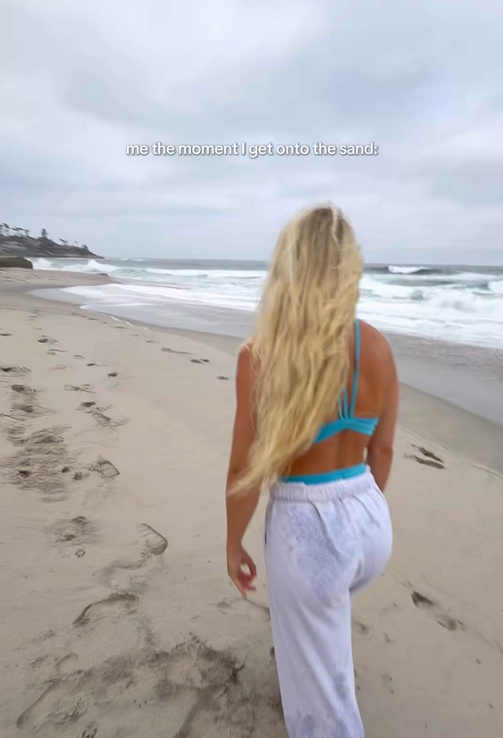 Early morning beach gymnastics: Backflip practice by the ocean