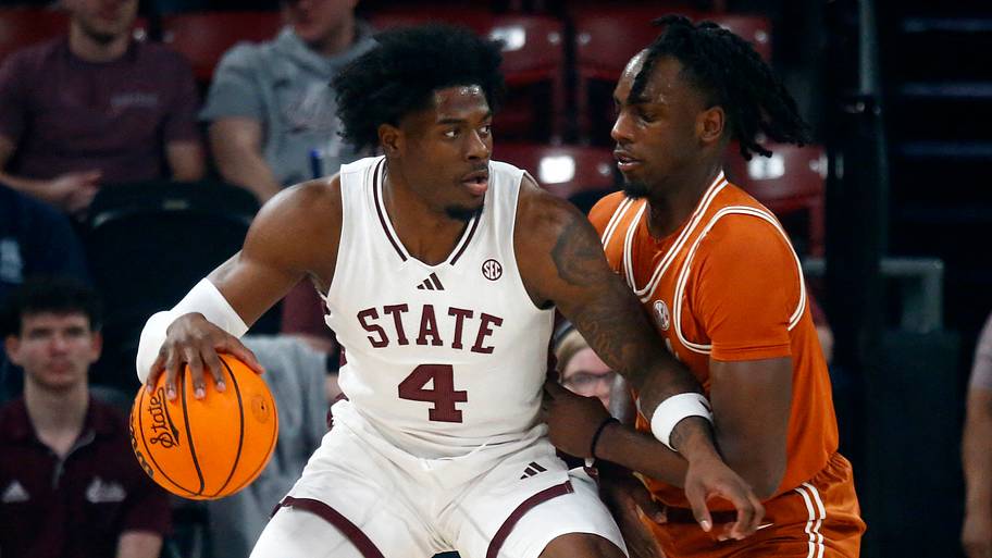 Mississippi State Bulldogs forward Cameron Matthews (4) dribbles as Texas Longhorns forward Arthur Kaluma (6) defends during
