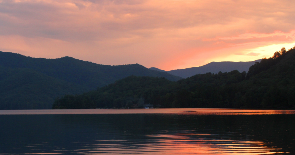 Stunning peach sunset over Lake Santeelah in North Carolina.