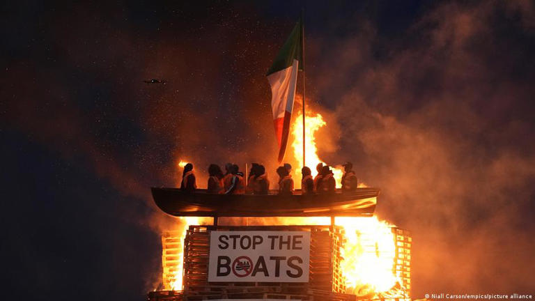 Anti-immigration symbols have also appeared on the bonfires, including this one in Moygashel last year