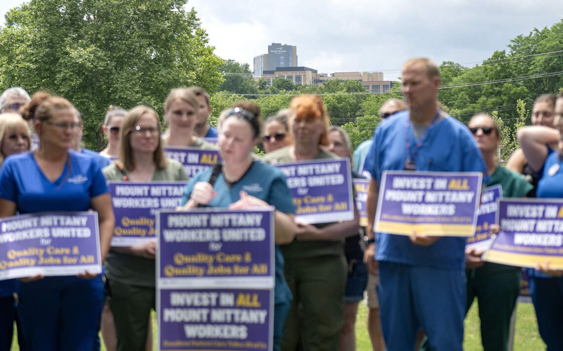 Mount Nittany Medical Center is seen in the distance as Sabrina Casher speaks with unionized workers on Thursday, July 9, 2026.