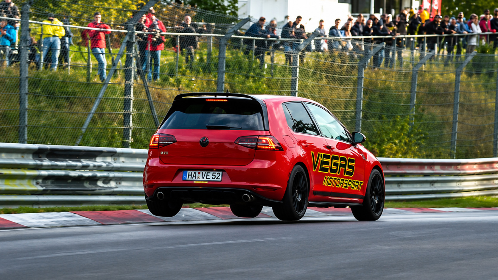 Volkswagen GTI goes airborne while pushing hard at Nürburgring