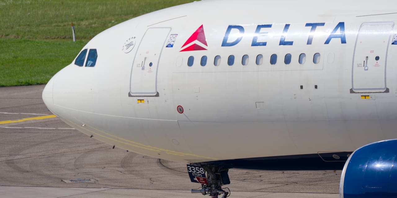 Delta reports record revenue and a profit beat, even as fuel costs surge