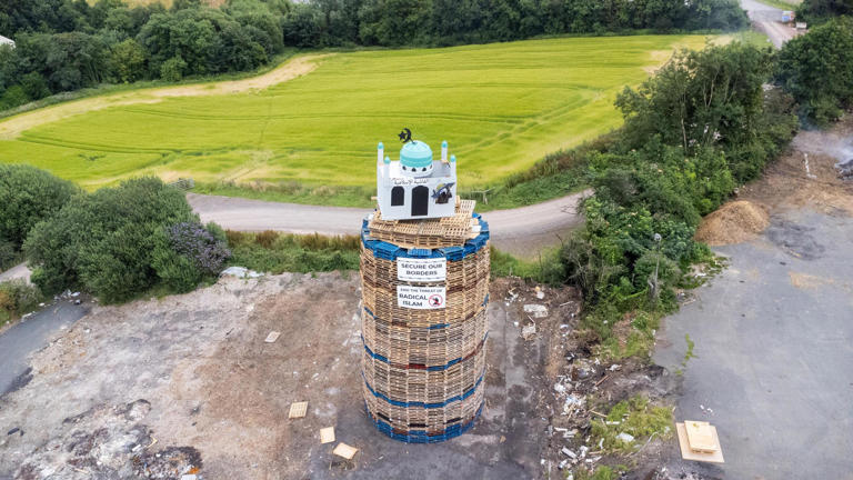 Moygashel bonfire topped with replica mosque is set alight before bid ...
