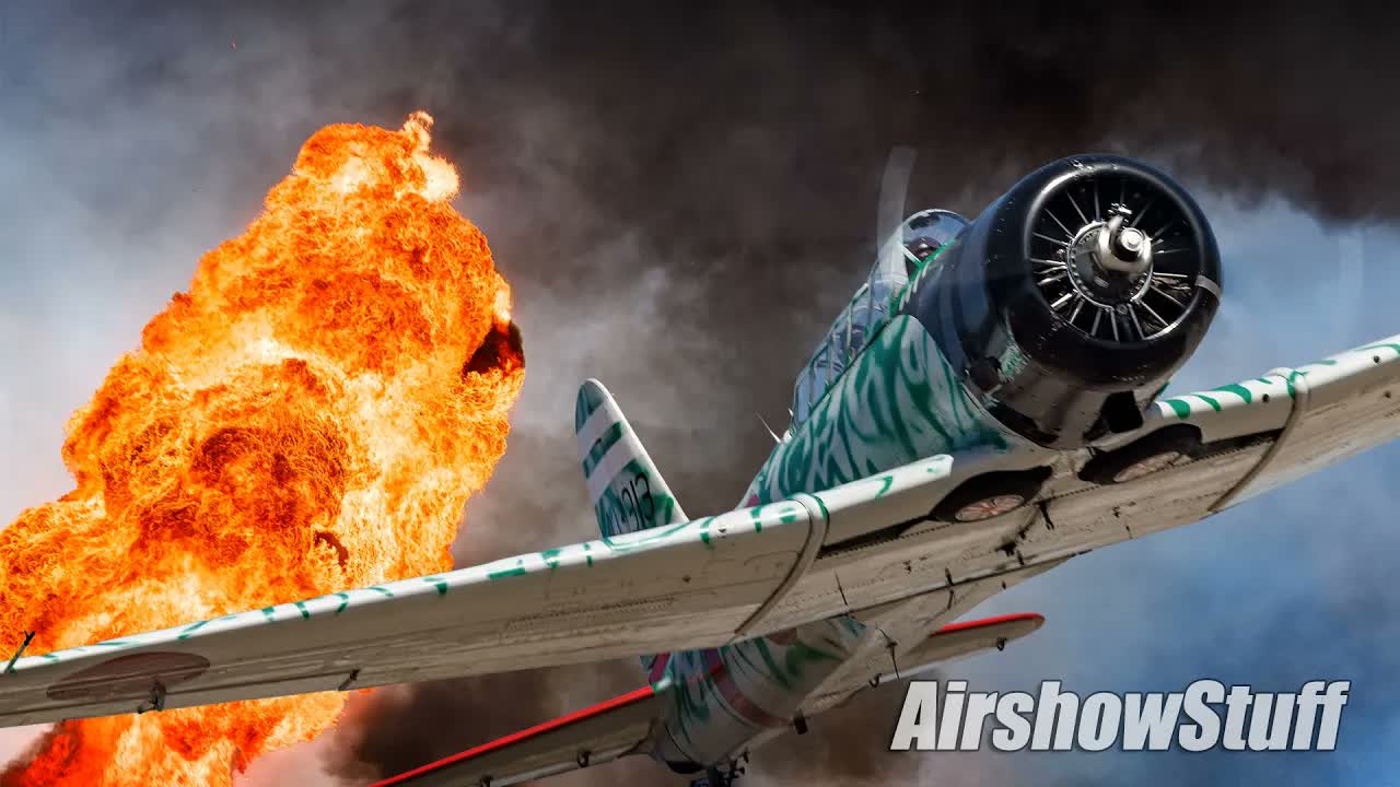 Watch aircraft dive through smoke, fire & pyro blasts - 