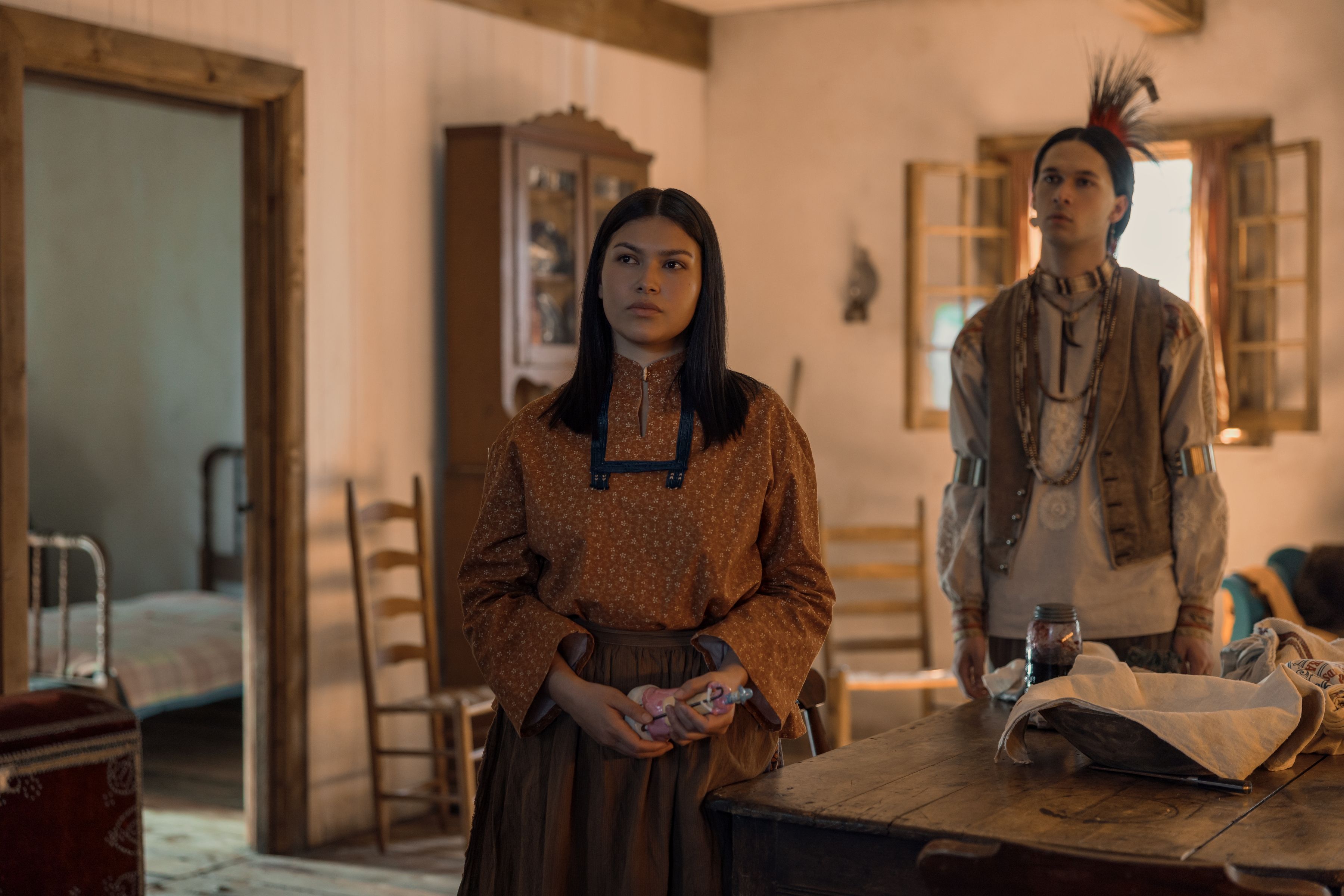 (L to R) Alyssa Wapanatâhk as White Sun, Xander Cole as Little Puma in episode 102 of Little House on the Prairie.