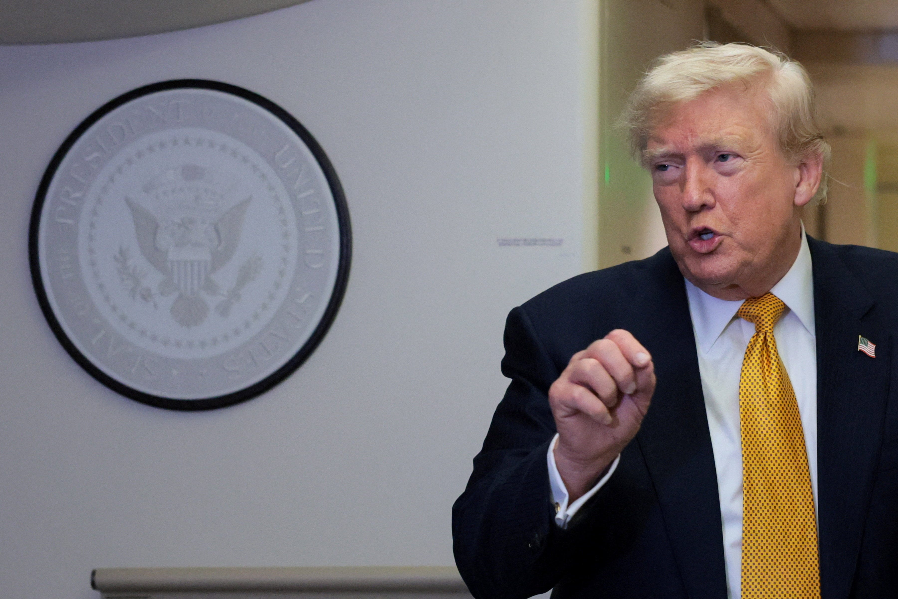 Trump says he won't sign housing bill set to become law at midnight