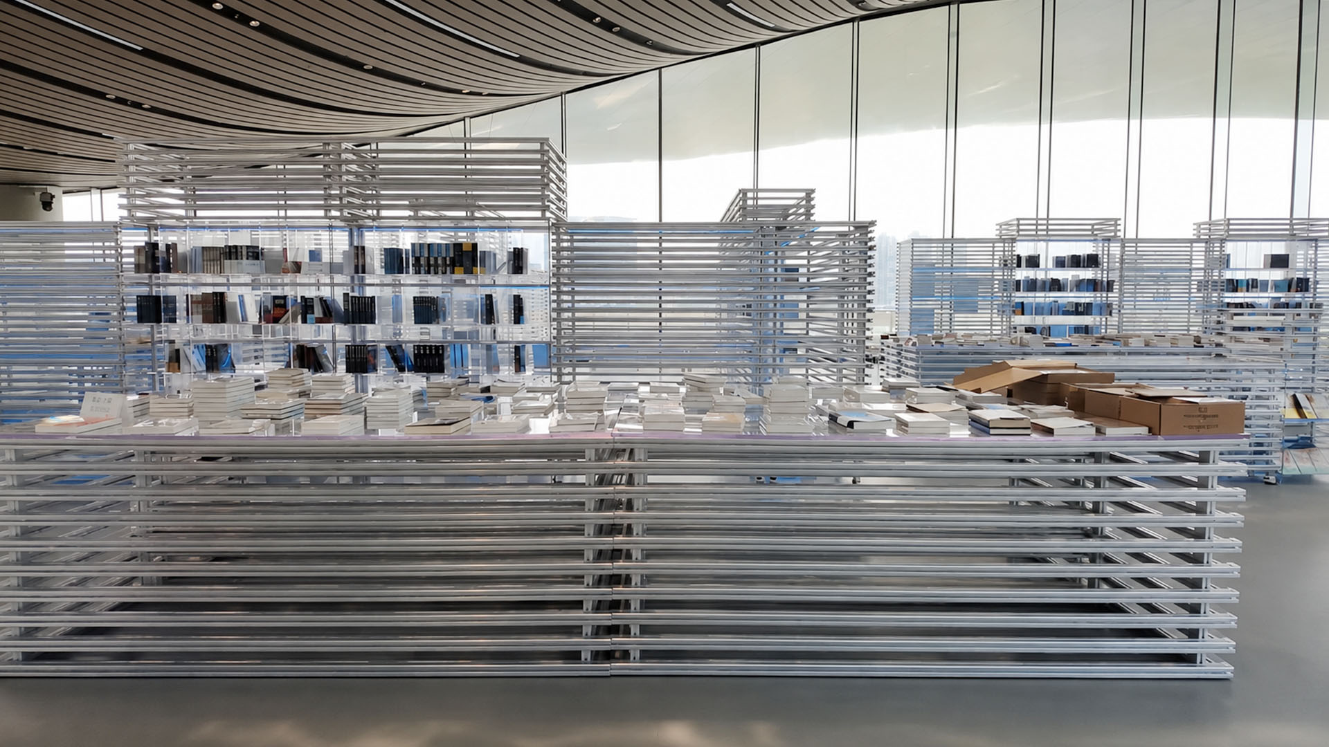 Open bookshelves create flexible learning spaces inside modern Chinese ...