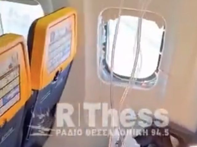 Ryanair passenger sucked out of airplane window saved by wife pulling him back in