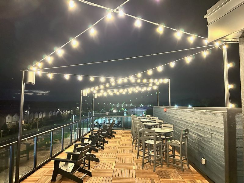 This stunning Indiana rooftop eatery pairs premium steaks with ...
