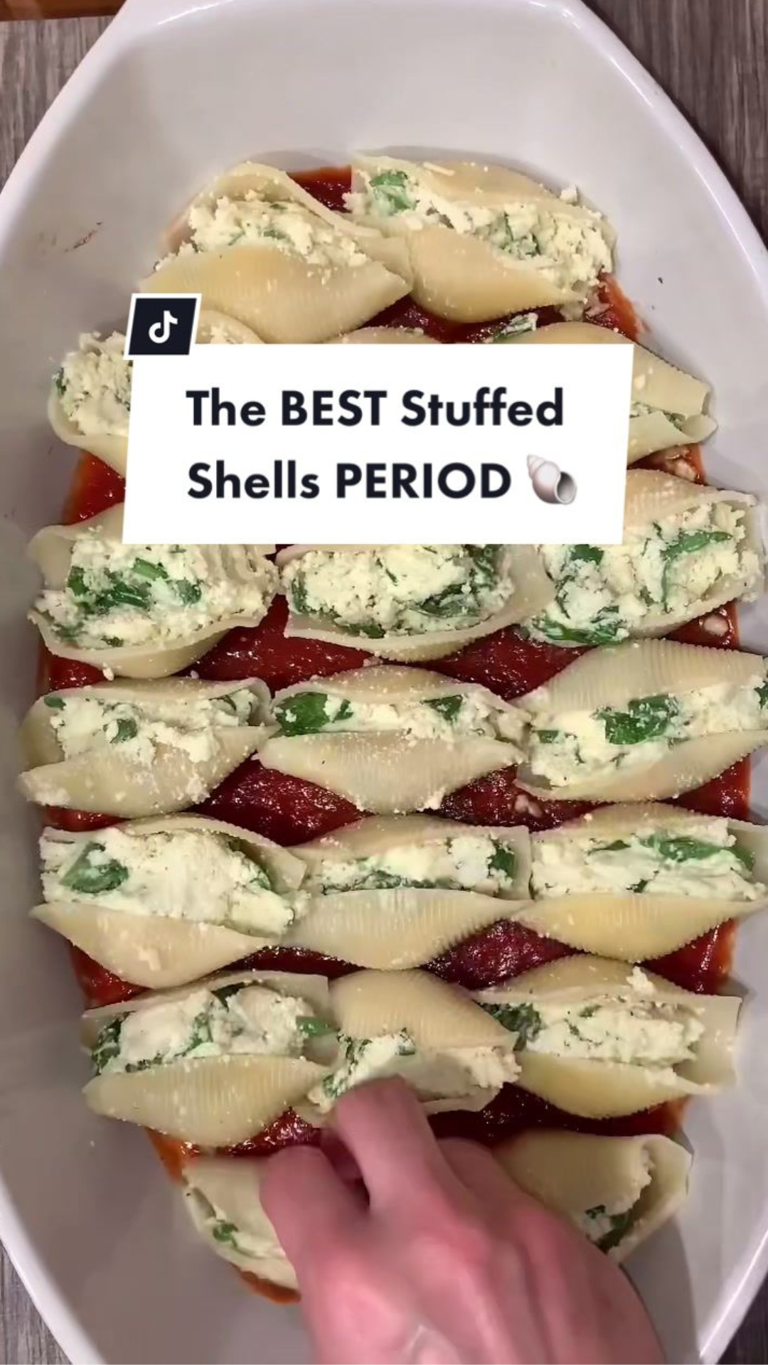 Cheesy stuffed shells baked with rich pasta sauce