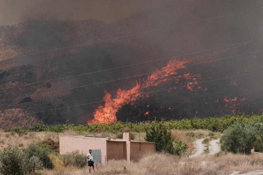 One of Spain's deadliest wildfires has killed at least 12 people, with 23 others missing