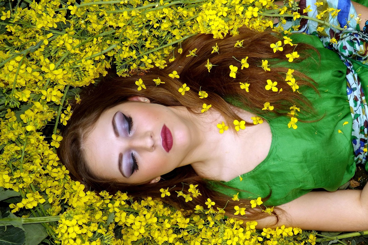 Woman sleeping in flowers
