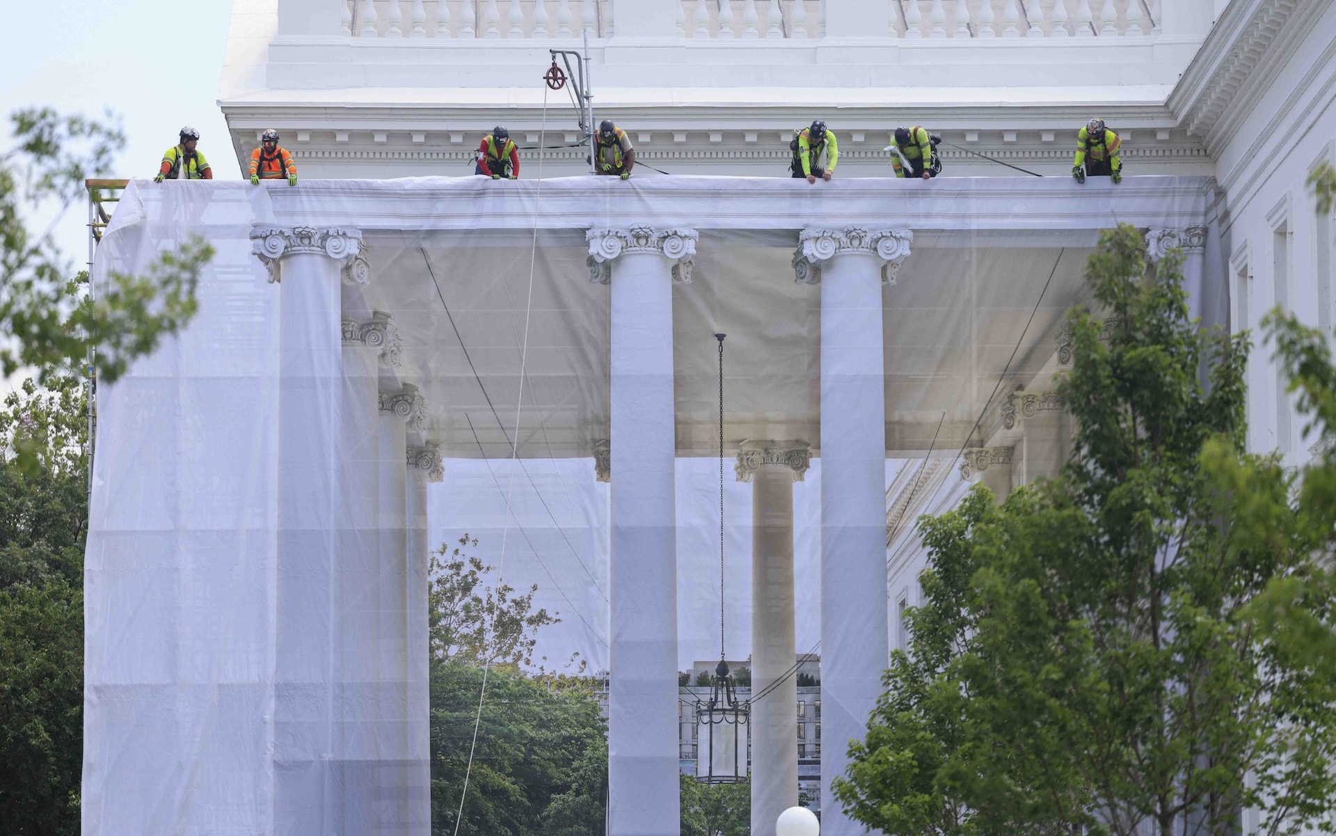 Trump covers up White House for latest beautification efforts