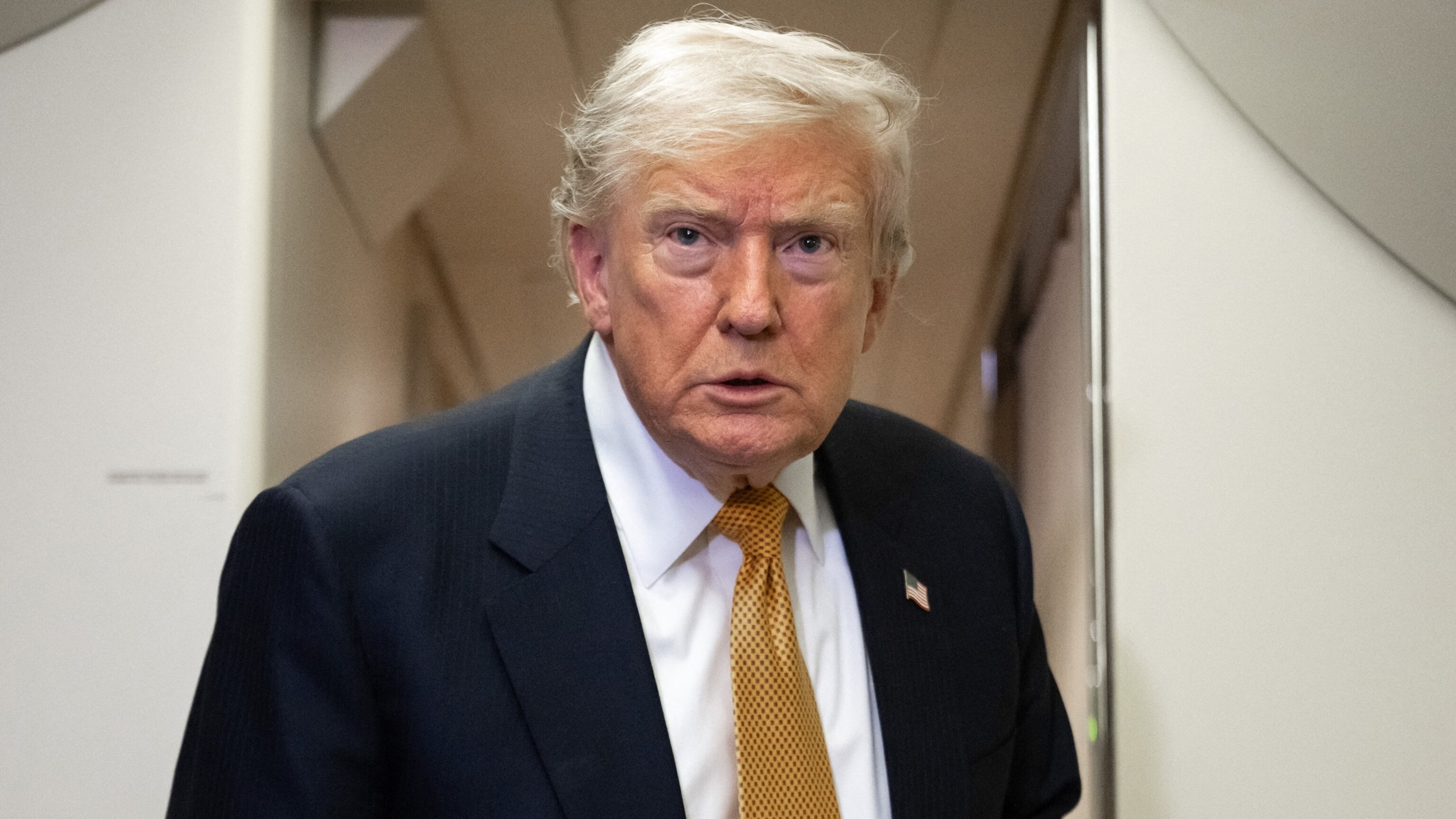 Trump says he won't sign bipartisan housing bill, but doesn't threaten veto either