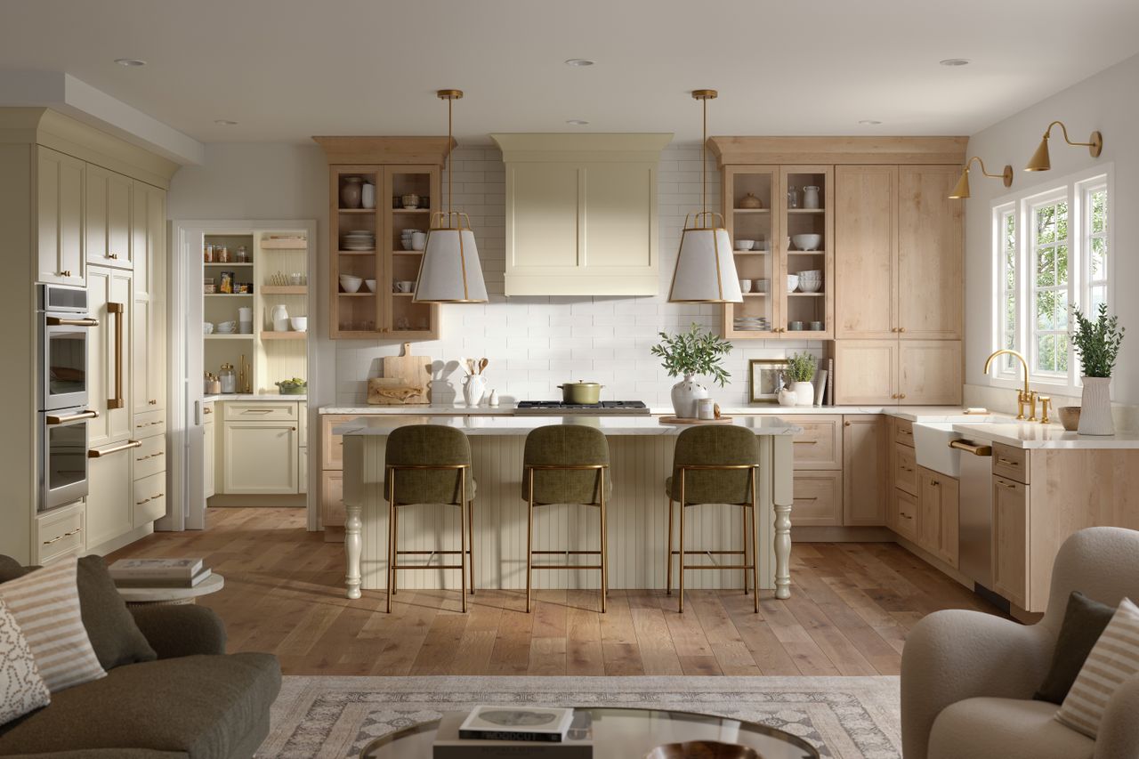 Modern kitchen design with wooden cabinetry large island pendant lighting and comfortable seating
