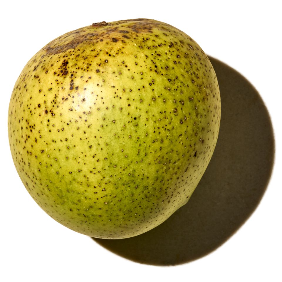 A mango with a shadow