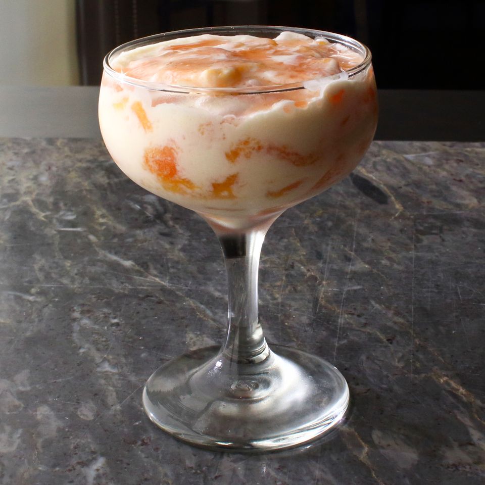 close up view of a Peaches and Cream dessert in a glass