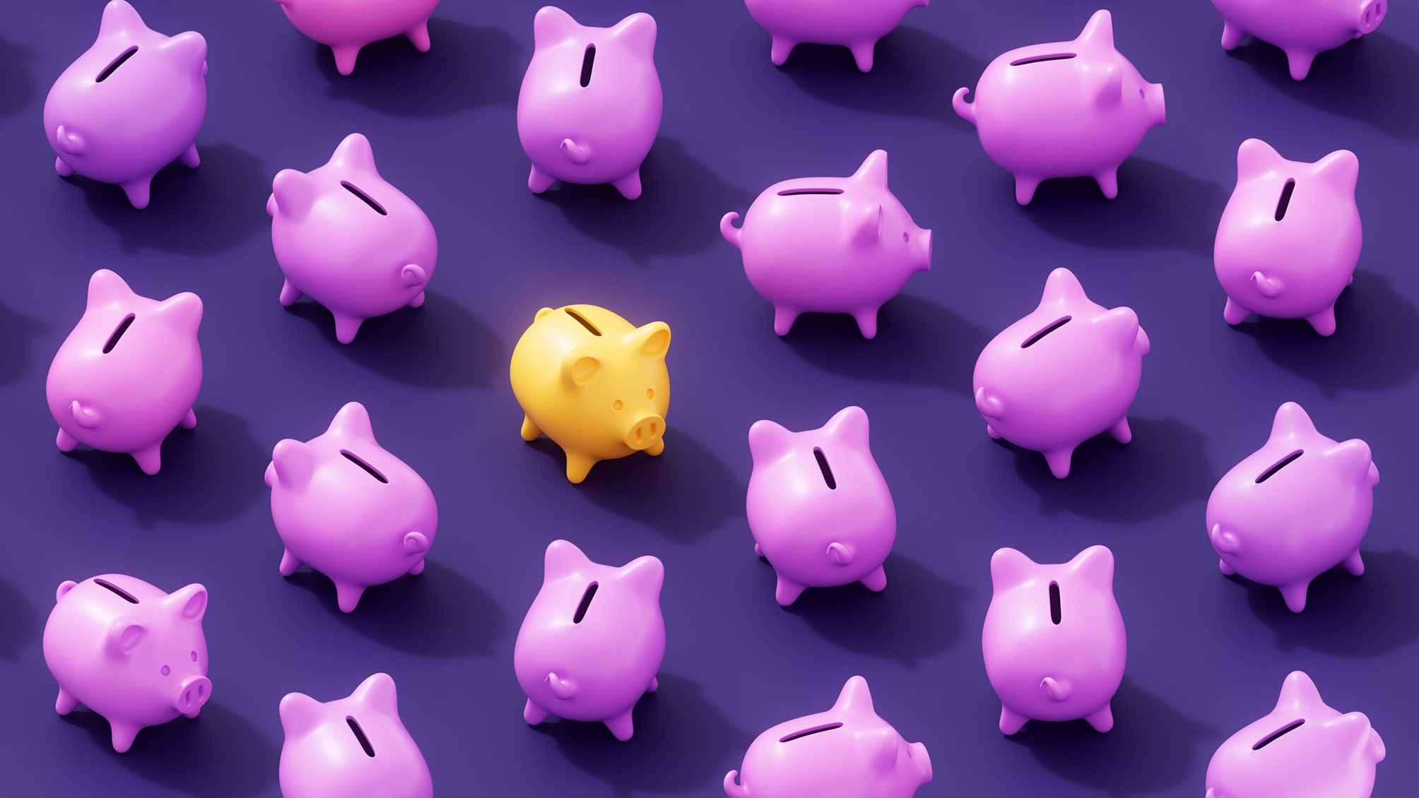 A gold piggy bank surrounded by pink ones.