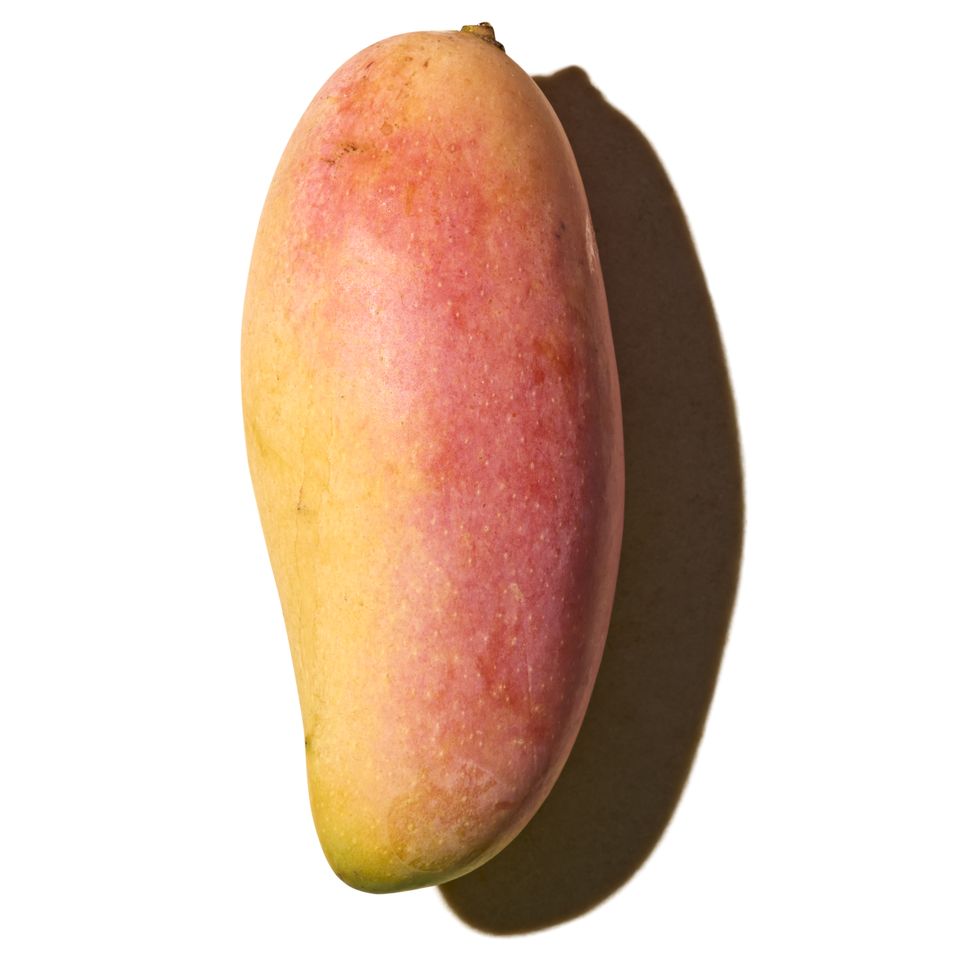 A Maya Chanok mango displayed against a white background