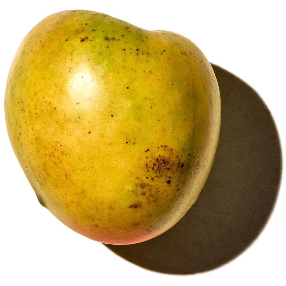 A single mango with light shadow