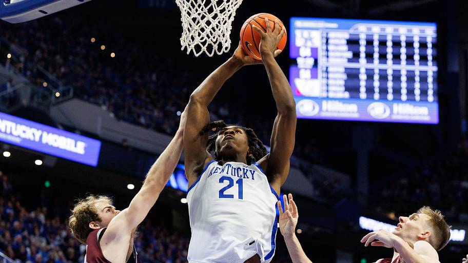Kentucky Wildcats forward Jayden Quaintance (21) goes to the basket against Bellarmine Knights forward Michael Wilson Jr. (24