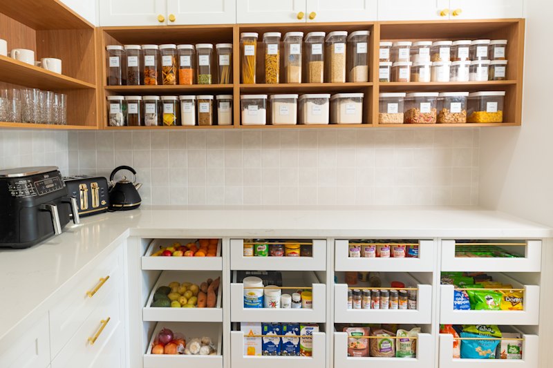 Should you decant pantry staples? Professional organisers' tips for setting up a kitchen cupboard that works for you
