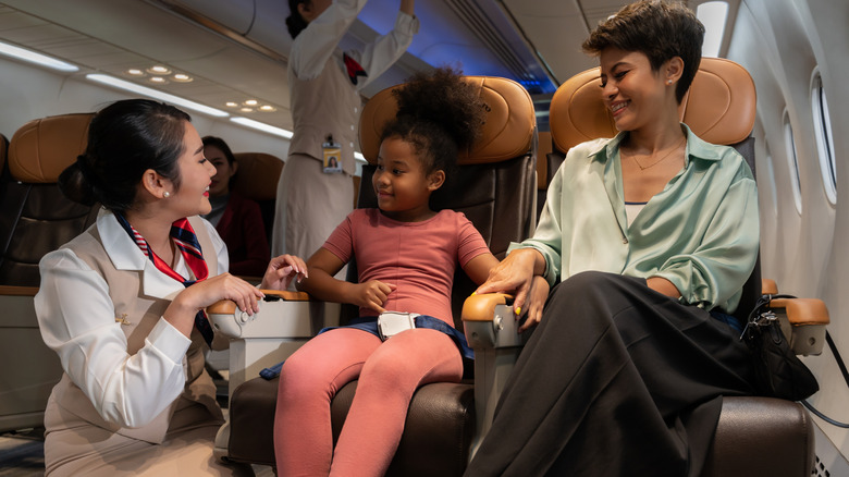 How To Handle A Kid Kicking Your Airplane Seat, According To A Flight Attendant