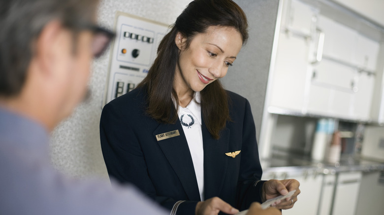 How To Handle A Kid Kicking Your Airplane Seat, According To A Flight Attendant