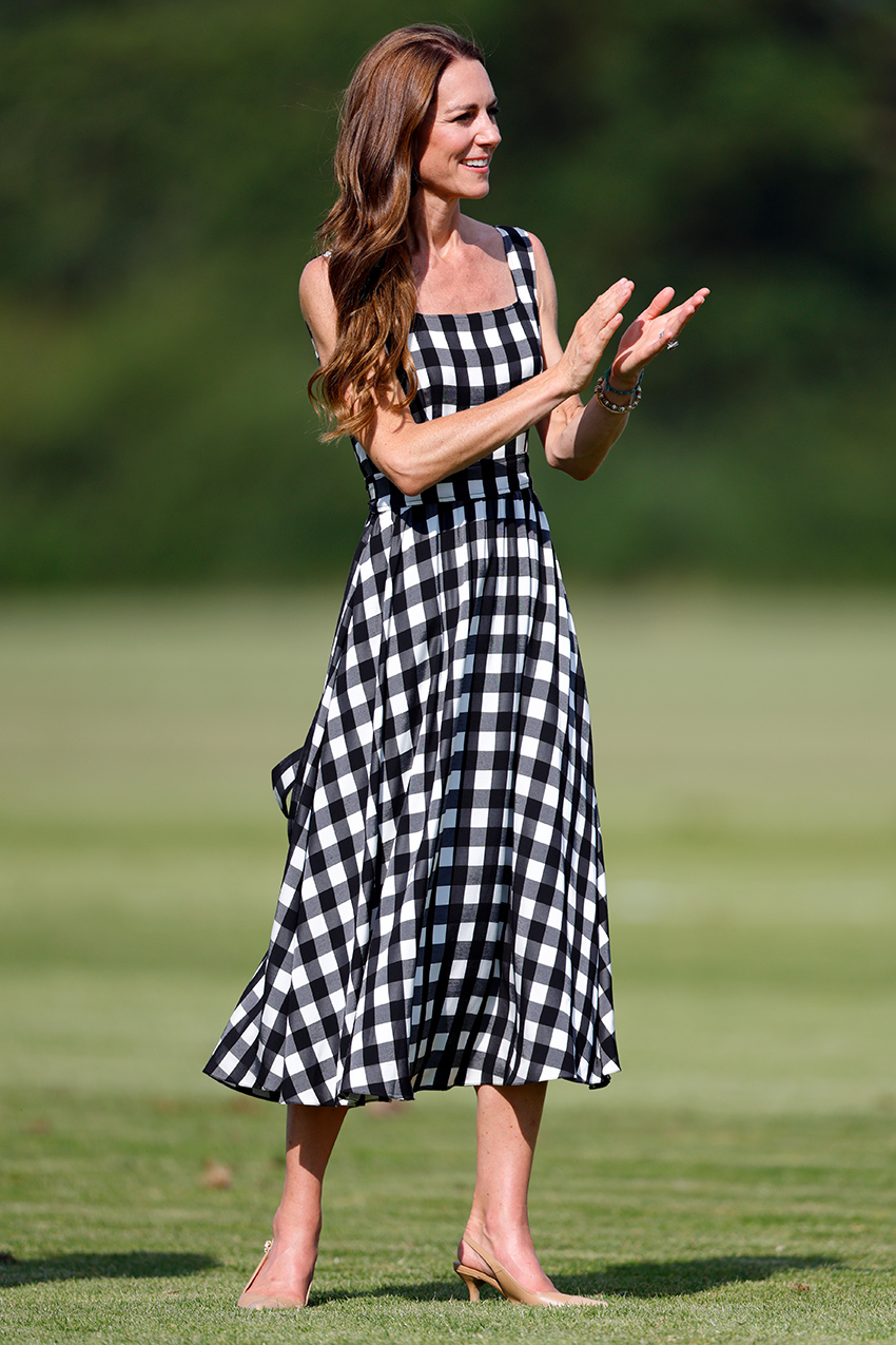 Kate Middleton wearing an A-line black-and-white gingham dress and slingback nude pumps at a charity polo match