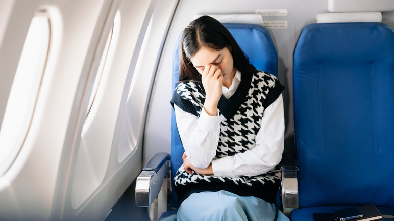 How To Handle A Kid Kicking Your Airplane Seat, According To A Flight Attendant