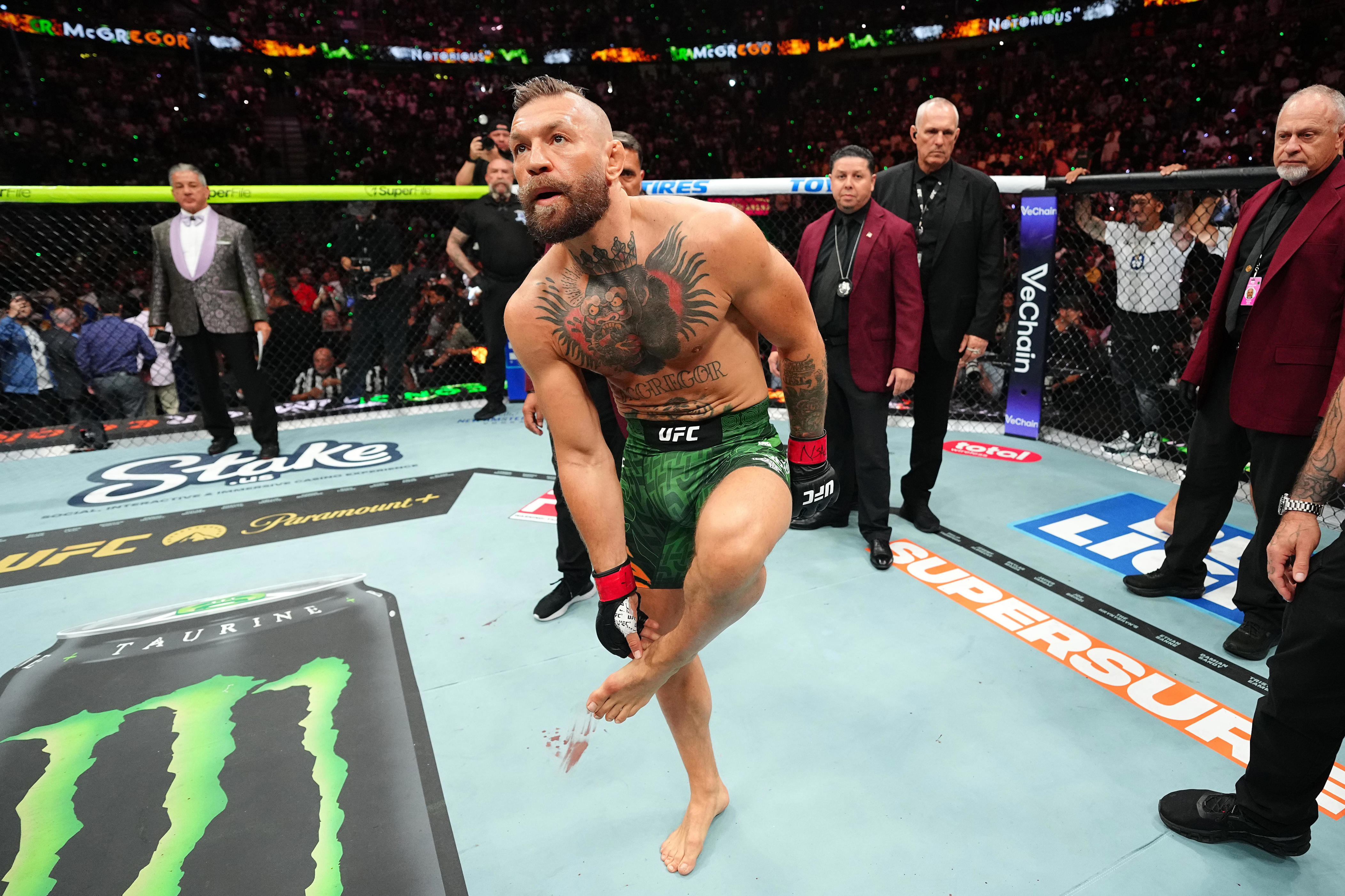 LAS VEGAS, NEVADA - JULY 11: Conor McGregor of Ireland reacts to the injury stoppage in a welterweight fight during the UFC 329 event at T-Mobile Arena on July 11, 2026 in Las Vegas, Nevada.