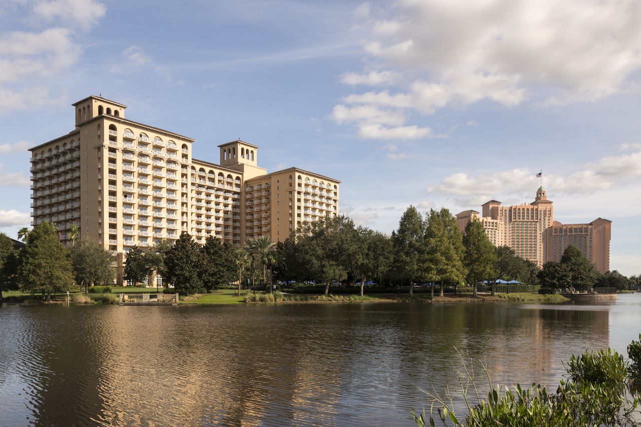 RitzCarlton Orlando Grande Lakes with a lake in the foreground