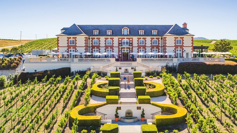The Domaine Carneros tasting room chateau, surrounded by sculptured gardens and vineyards.