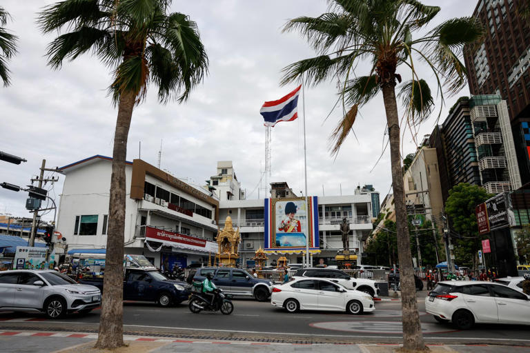 Vehicles drive past the main police station in Pattaya, Thailand. Two Chinese nationals suspected of running an illegal surrogacy business were detained in the seaside city earlier this month. Photo: dpa