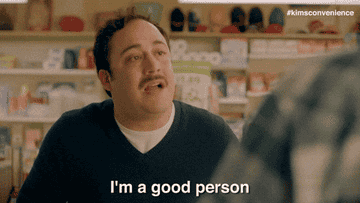 A person in a store gestures while saying,