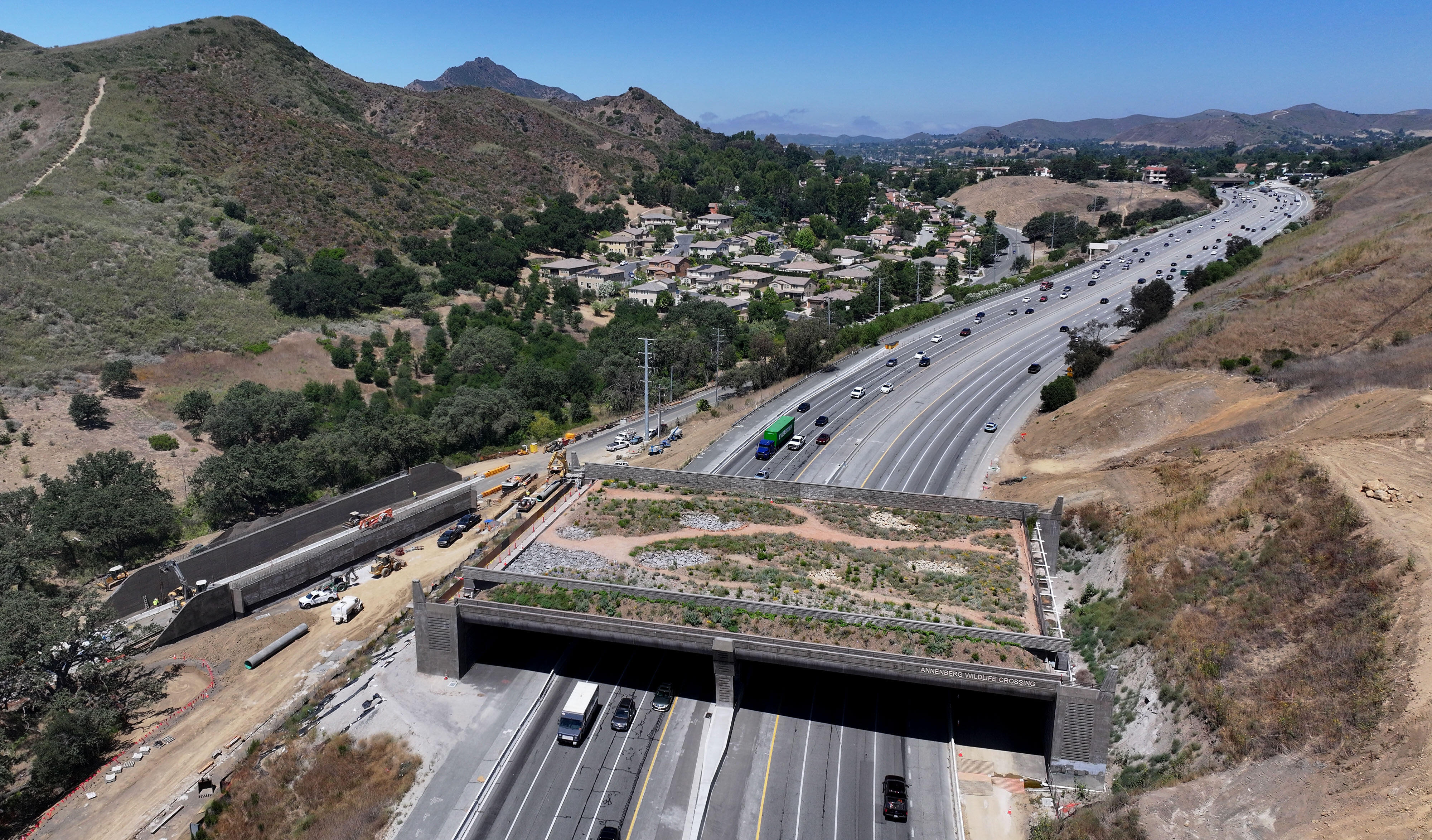 Work continues at the Wallis Annenberg Wildlife Crossing over the 101 Freeway in Agoura Hills, on Wednesday, June 17, 2026, which is scheduled to open on Dec. 2, 2026.