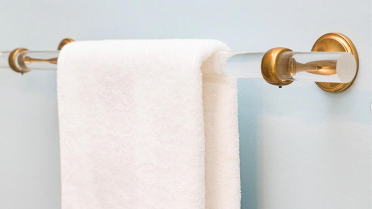 Ditch the crowded hooks: Here's a more creative way to hang bathroom towels