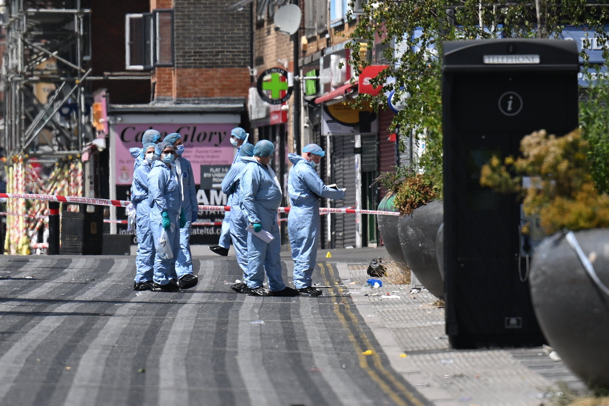 ‘Murder suspect' jumps from window after young mum ‘stabbed to death' in west London