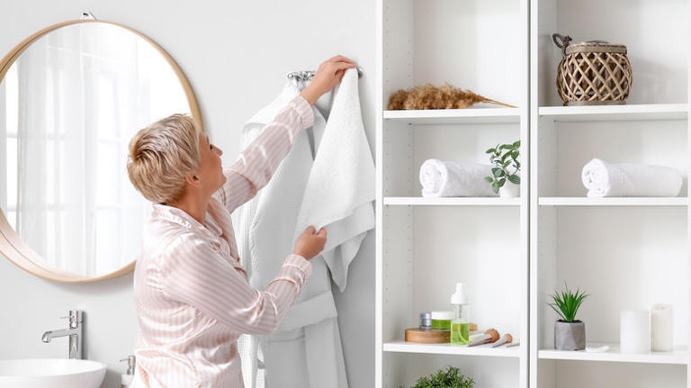 Ditch the crowded hooks: Here's a more creative way to hang bathroom towels