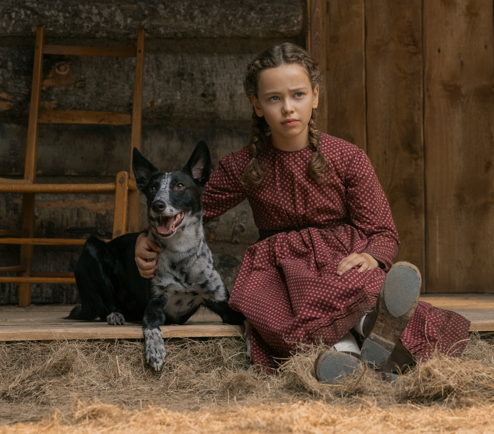 Laura Ingalls (Alice Halsey) cuddles Jack in 