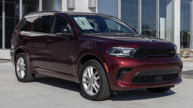 Front three-quarter view of dark red 2026 Dodge Durango parked on dealership lot