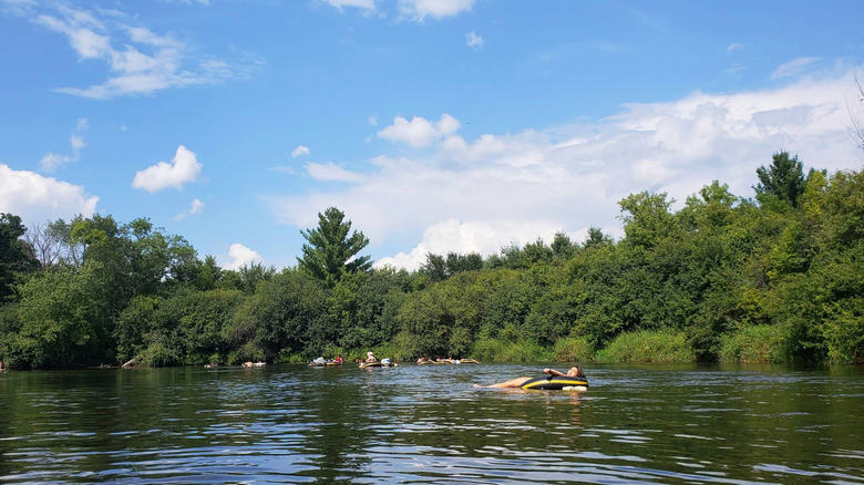 People tubing on the Apple River in Somerset, Wisconsin
